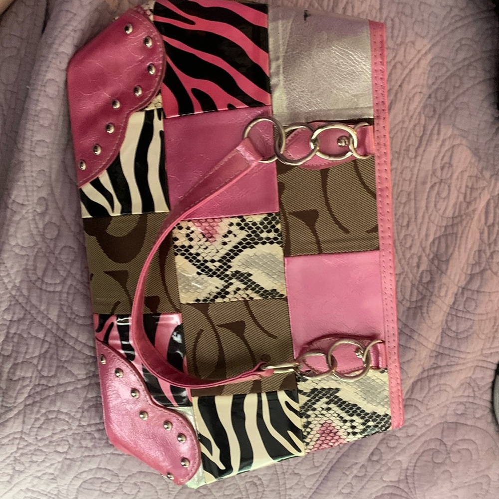 Faux coach punk zebra striped bag